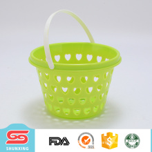 Household portable mini circular plastic fruit basket with hollow design